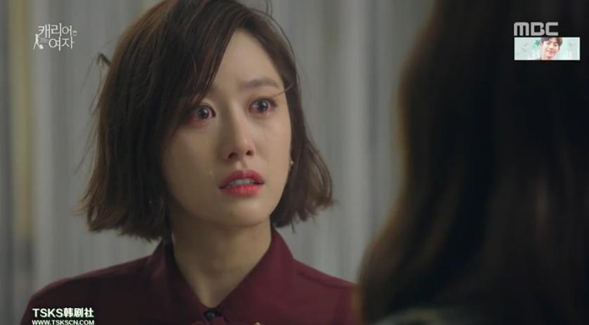 《拖旅行箱的女人》海报